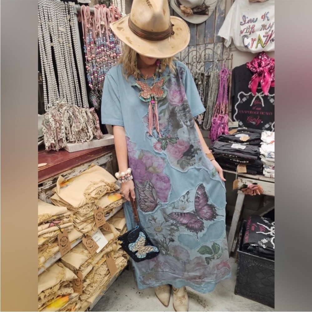 A Rare Bird Butterfly Floral Maxi Dress in Dusty Blue with appliqué details